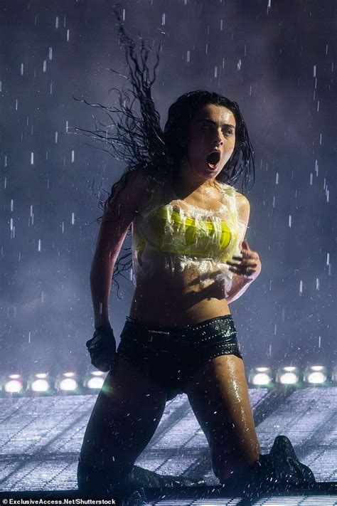 Charli Xcx Showcases Her Incredible Figure In A Skimpy Pink Lingerie Set Before Slipping Into