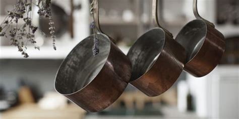 A 14 Towel Bar Is A Genius Way To Organize Pots And Pans Country