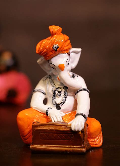 Buy Sn Handicrafts Ganesha Playing Harmonium Polyresine Idol Ganesh