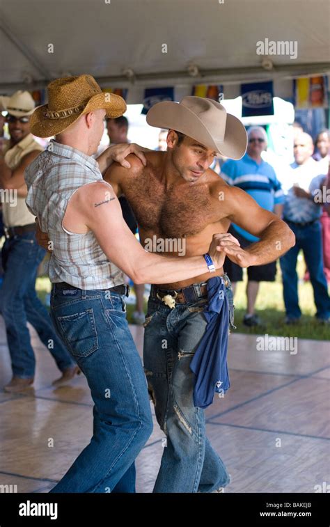 Gay Couple Dancing To Country And Western Music At Rodeo Event Stock Photo Alamy