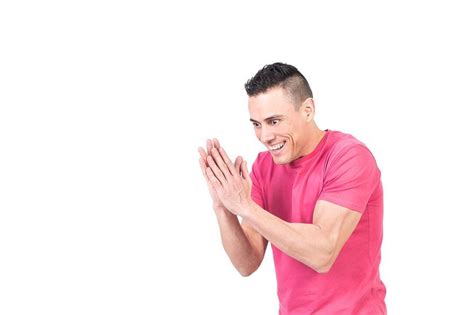 Excited male rubbing hands and looking away – Artofit