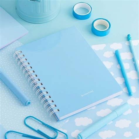 CUADERNO RAYADO A5 PUNTO CERO CELESTE PASTEL