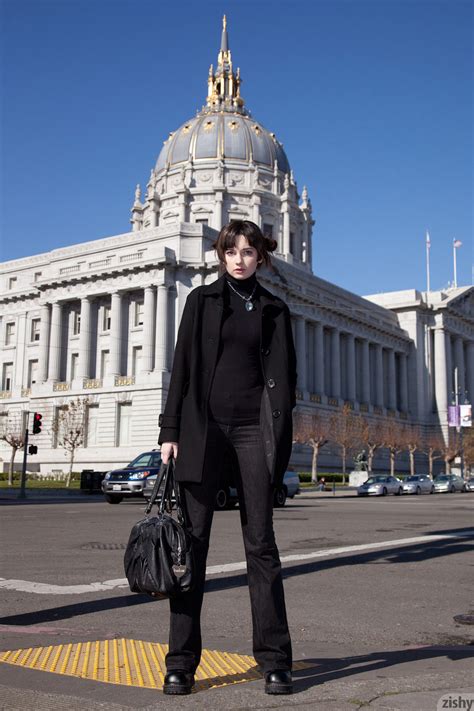 Sexy Brunette Showing Off Her Long Legs In Fashionable Jeans And Body Suit CoedCherry