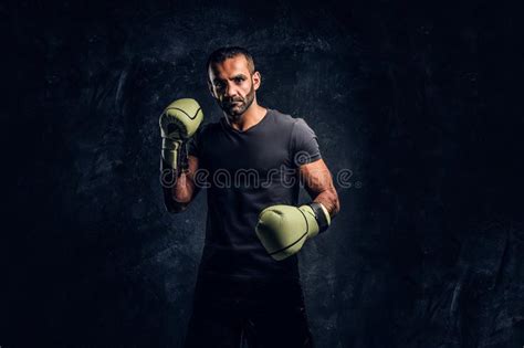Portrait Of A Brutal Professional Fighter With Naked Torso Posing For A Camera Stock Photo