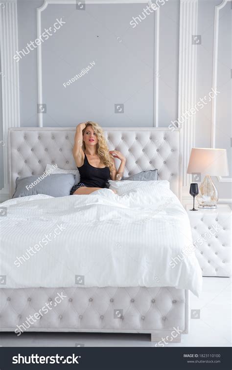 Sexy Blonde Black Dress Poses On Stock Photo 1823110100 Shutterstock
