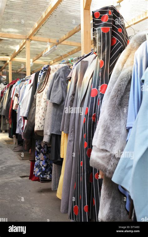 berlin germany  worn clothes rails kleidungsstuecken stock photo