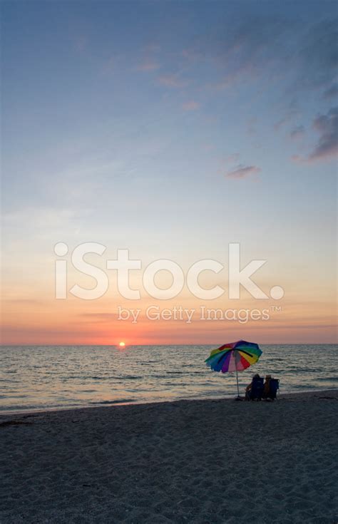 Beach Umbrella With Sunset Stock Photo Royalty Free Images Freeimages