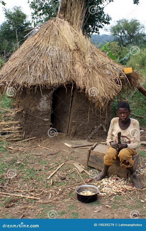 African Boy And Mud Hut Editorial Stock Image Image 19039279