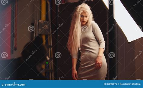 Sensual Blonde Caucasian Blonde Female Model Posing For Photographer Fashion Backstage Stock