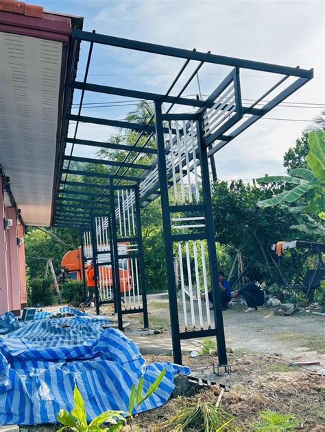 หลังคาโรงรถเชียงราย ทำโรงรถเชียงราย โรงจอดรถเชียงราย ต่อเติมหลังคาเชียงราย ช่างต่อเติมโครงหลังคา