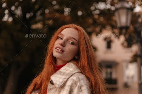 Beauty Portrait Of Attractive Ginger Posing On Street Pretty Long Haired Girl With Nude Makeup
