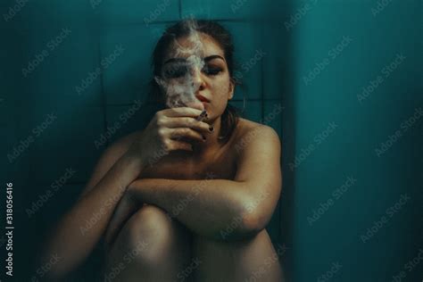 Naked Woman Smoking Cigarette Against Wall Stock Photo Adobe Stock