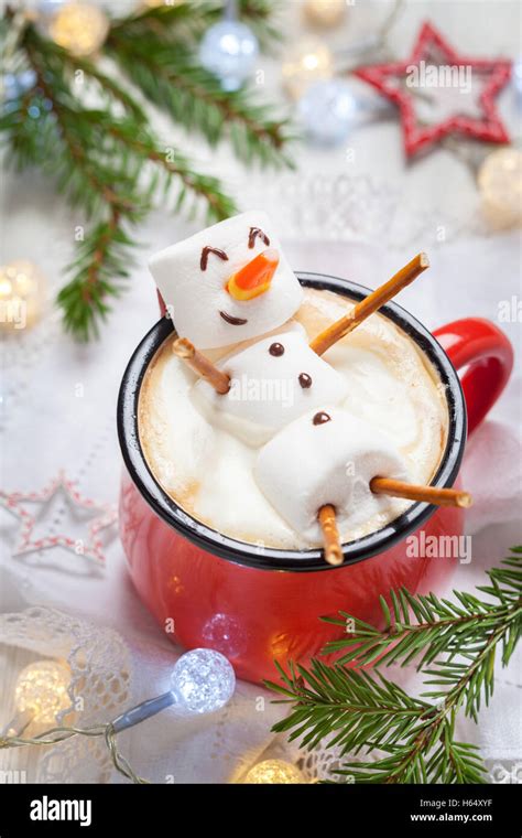 Hot Chocolate With Melted Marshmallow Snowman Stock Photo Alamy