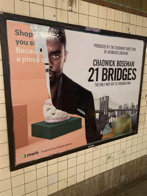 A ripped poster in an NYC subway station reveals a movie that came out