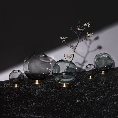 Create A Sleek Contemporary Look In The Home With This Globe Vase From