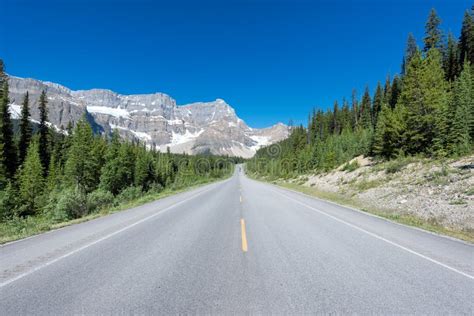 Highway on Mountain Road Trip in Rocky Mountains Stock Photo - Image of ...