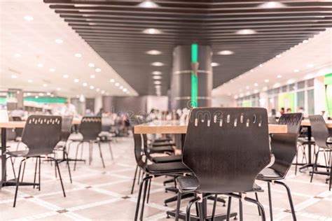 Modern Interior Of Cafeteria Or Canteen With Chairs And Tables Stock