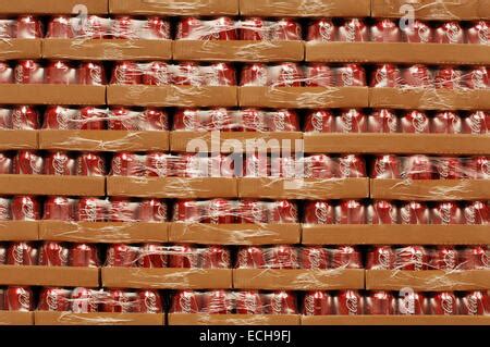 Coca Cola Cocacola can Warehouse boxes from shelf with forklift Stock