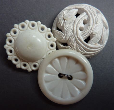 Decorative White Buttons • These Look As Though Made Of Bakelite Which