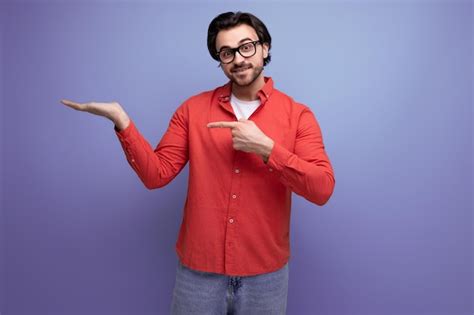 Premium Photo Handsome Year Old Brunette Millennial Man With Gorgeous Hair Shows His Hand To