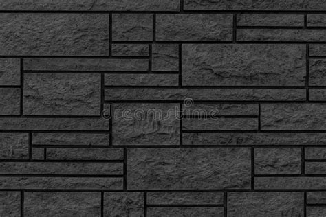 Pattern Of Black Stone Cladding Wall Tile Texture And Seamless