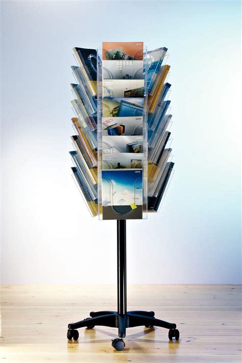 Книжная полка напольная вращающаяся 85 фото