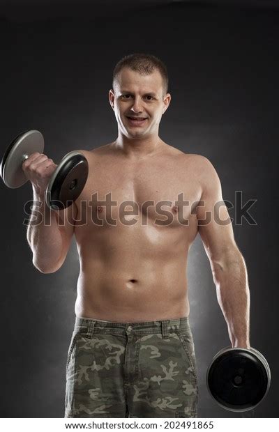 Man Lifting Dumbbells Hal Naked On Stock Photo 202491865 Shutterstock