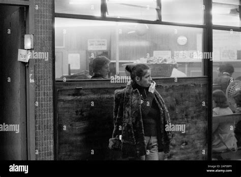 London 1970s Lone Woman In Fur Coat Model Prostitute Hand Written Sign Pinned To Door She Is