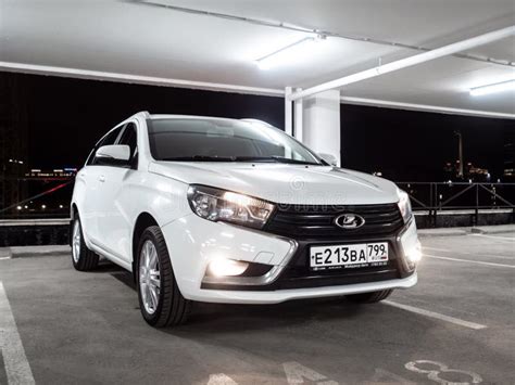 White Lada Vesta Sw Station Wagon In An Empty Multi Storey Car Park At