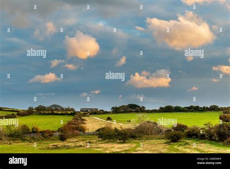 A View Of Spyway Barn At Sunset Near Langton Matravers On The Isle Of