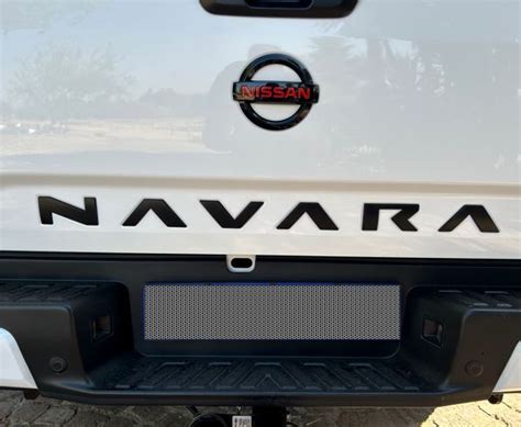 nissan navara  kromex tailgate logo   black gunmetal