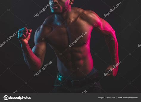 Naked Torso Of African Man Posing At Studio On Dark Background Close Up Stock Photo By