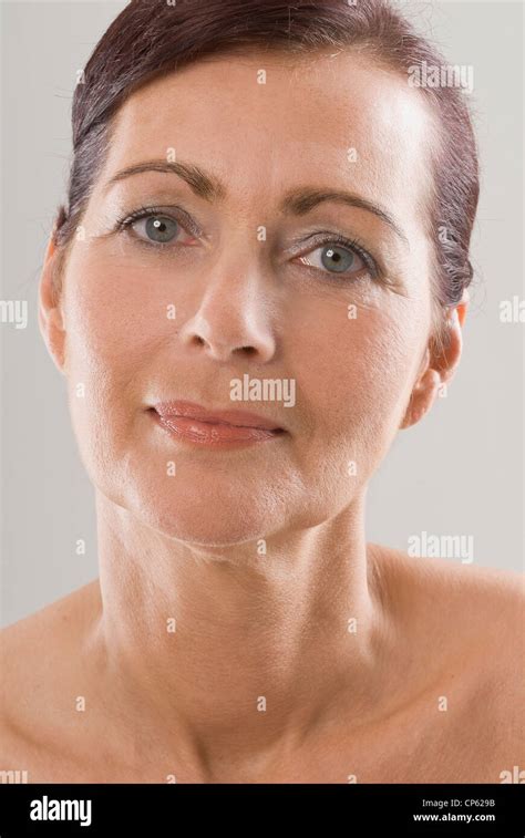 Mature Woman Smiling Portrait Stock Photo Alamy
