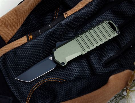 Mini automatic OTF knife is loaded with satisfying features in a pocket ...