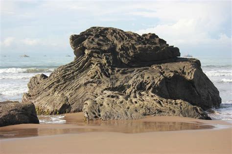 Large Rock On The Beach Of Pelabuhan Ratu Indonesia Stock Image