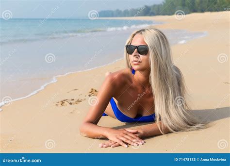 Slim Blonde Long Haired Woman In Bikini On Tropical Beach Stock Image