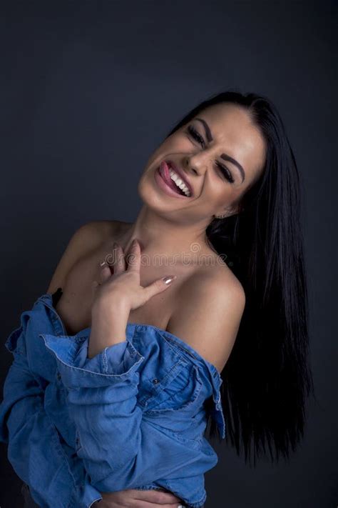 Attractive Brunette Woman Posing To Camera In Blue Shirt Stock Image Image Of Posing People