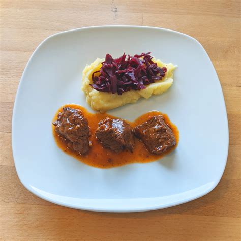 Beef Goulash With Red Cabbage And Mashed Potatoes