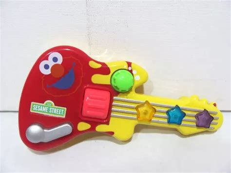 Vintage Sesame Street Lot Of 2 Elmo Guitar And Ernie Tricycle Mattel 35