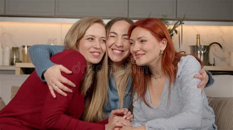 Portrait Of Mature Female Friends Former Classmates Hugging During Reunion Stock Footage Video