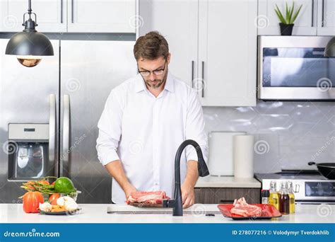 Chef Mature Man Cooking Food In Kitchen Handsome Man Preparing Healthy Food In Kitchen Guy