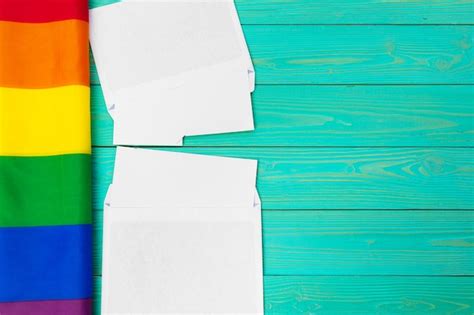 Premium Photo Bright Rainbow Gay Flag On Wooden And Blank Space