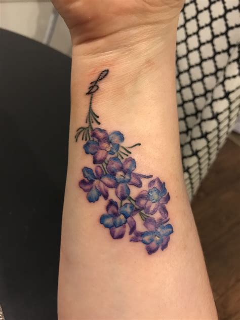 195+ Beautiful Larkspur Tattoo Designs (2023) - TattoosBoyGirl