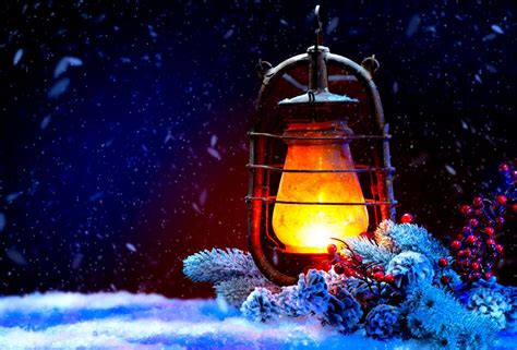 Lit Lantern Standing in Snow - Sally K. Norton