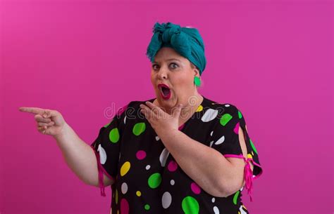 Plus Size Model Woman With Trendy Makeup Fashionable Blonde In Black Short Dress Posing At The