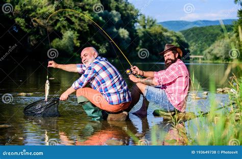 Big Game Fishing Relax On Nature Retired Father And Mature Bearded Son Happy Fishermen