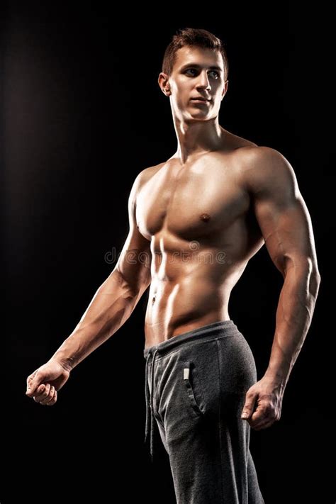 Very Muscular Man Posing With Naked Torso In Studio Stock Image Image Of Pectoral Athlete