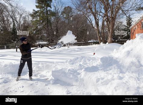 Man Shoveling Snow From Driveway Virginia Usa Stock Photo Alamy