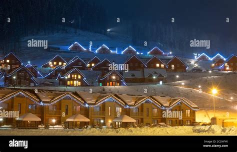 Landscape of ski village at night Stock Photo - Alamy