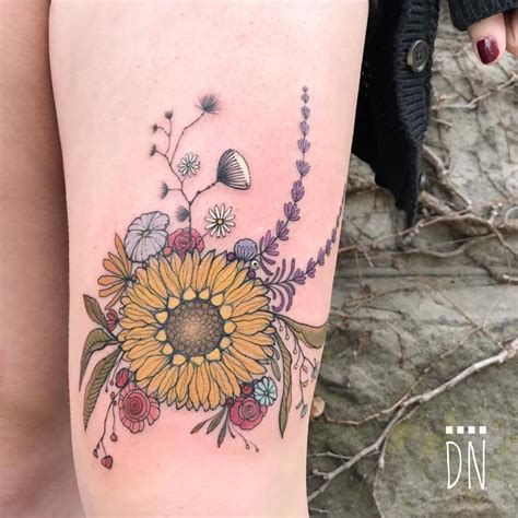 Sunflower Tattoo On The Left Thigh